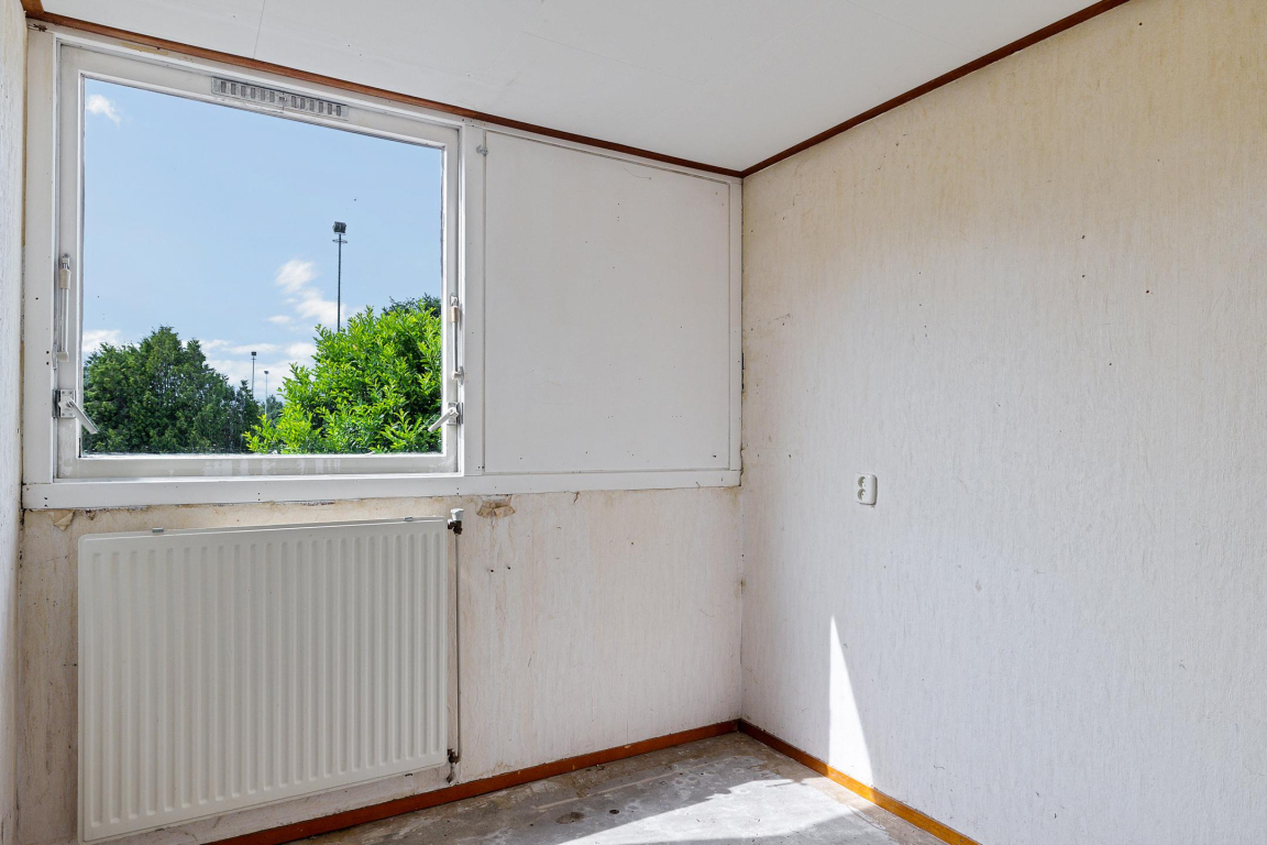 Foto 11 van De Weerdstraat 16 in Klazienaveen-Noord