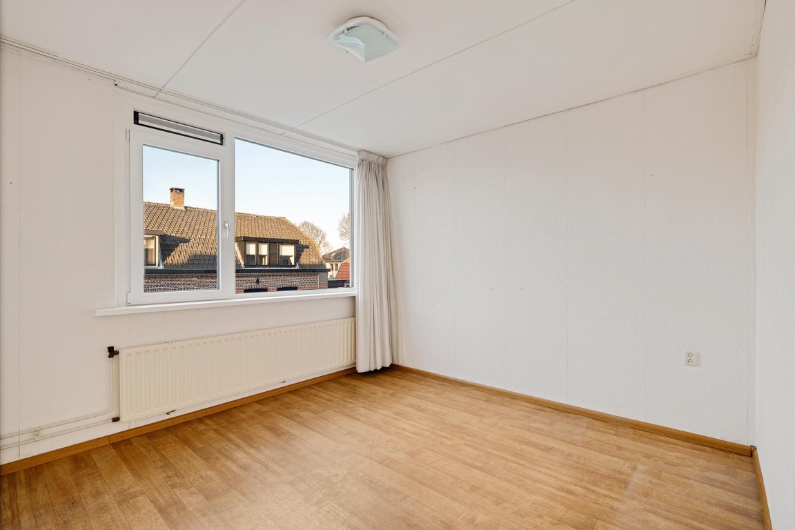 Foto 15 van Heistraat 27 in Rijen